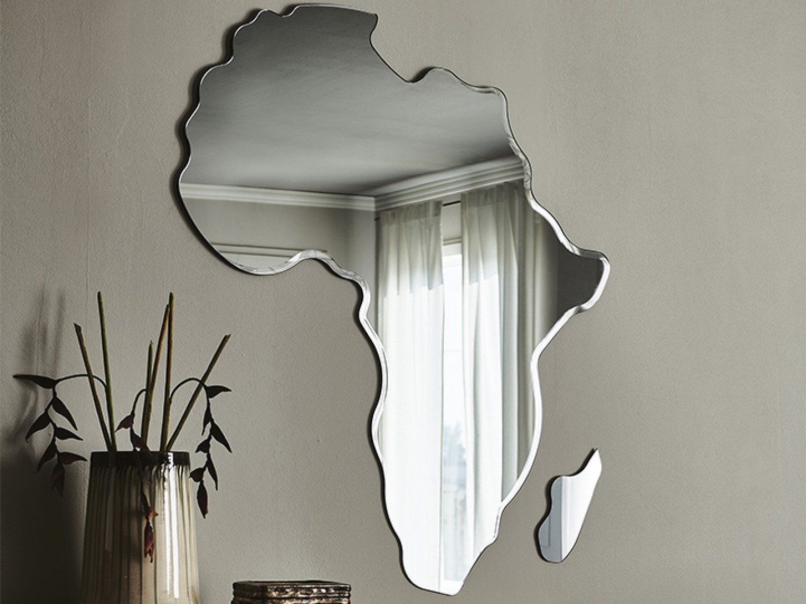 specchio cattelan africa